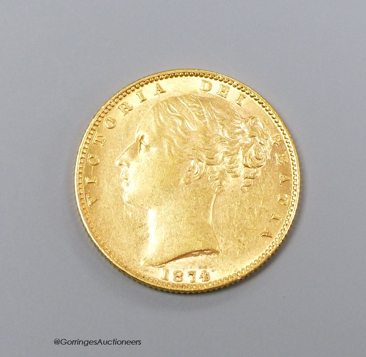 A Victoria gold sovereign 1874M, good VF